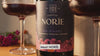 Norïe Lots of Purple bottle served chilled with sparkling drink in a glass
